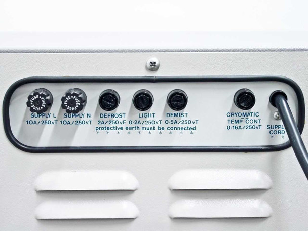 Rear fuse panel showing Supply L and N 10A fuses, Defrost 2A, Light 0.2A, Demist 0.5A, Cryomatic Temp Cont 0.16A fuses, and supply cord connection