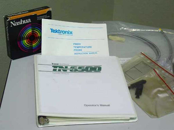 Tracor Northern TN-6500 included accessories — Operator's Manual binder, Tektronix P660I Temperature Probe Instruction Manual, Nashua 5.25-inch floppy diskettes, fiber optic cable, and misc hardware