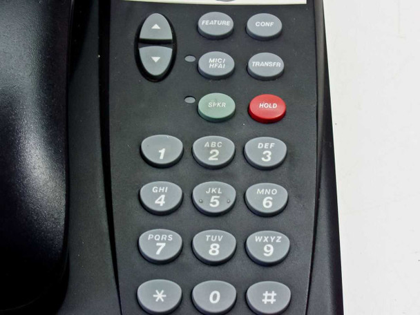 Avaya 6D-0003 keypad close-up showing dial pad, Hold, Transfer, Conference, Speaker, MIC/HFA, and Feature buttons