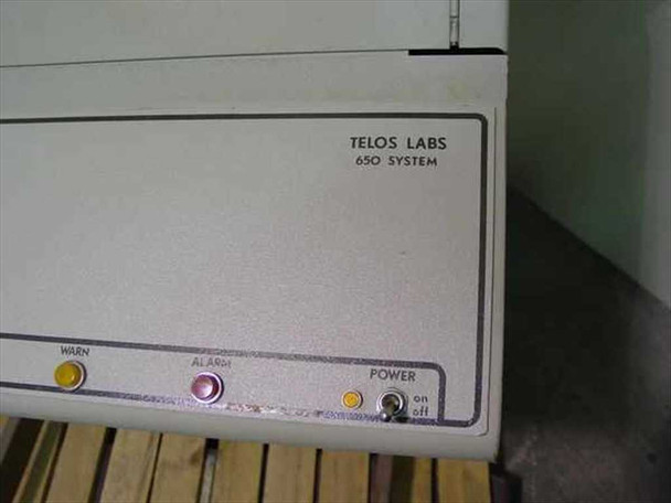 Telos Labs 650 System front panel close-up showing WARN, ALARM, and POWER indicator LEDs and on/off switch