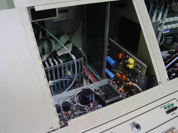 Telos Labs 650 System interior view with access panel open showing electronics chassis, power supply, and wiring harness