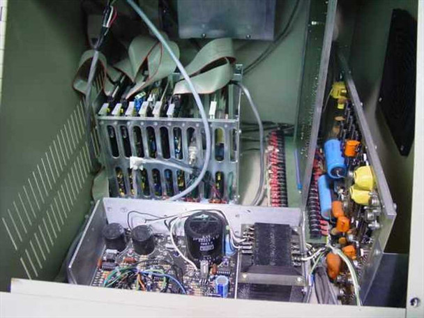 Telos Labs 650 System interior close-up showing main circuit boards, capacitors, ribbon cables, and power supply section