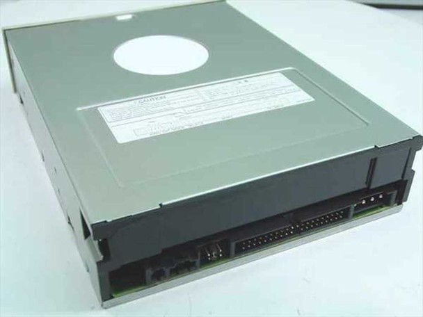 Toshiba XM-6502B CD-ROM Drive – rear view showing IDE ribbon connector, power connector, and caution label on top