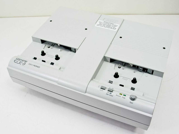 Telex Copyette 300350000 1-2-1 Mono cassette duplicator — top/front three-quarter view showing both cassette wells open and control panel