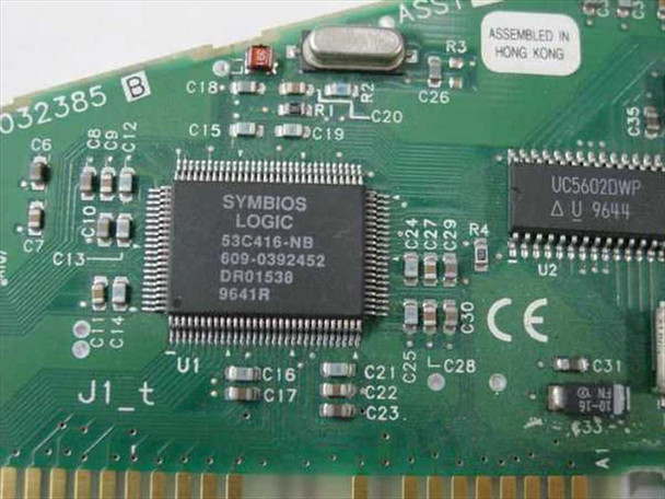 Symbios Logic 53C416-NB SCSI controller chip close-up with part number 609-0392452 and 'Assembled in Hong Kong' label visible