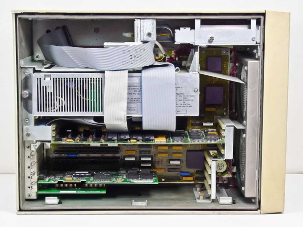 Sun Microsystems 386i/150 interior view showing motherboard, ribbon cables, expansion cards, memory modules, and internal power supply