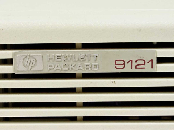 HP Hewlett-Packard 9121 nameplate close-up on front panel vents