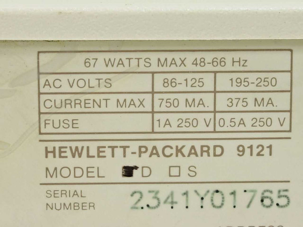 HP 9121D rear label showing model D designation, serial number 2341Y01765, and power ratings: 67W max, 86-125V / 195-250V AC, 48-66 Hz