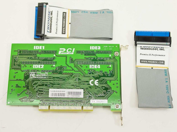 Promise FastTrak100 TX4 card solder side showing IDE1 through IDE4 port labels, PCI logo, FCC label, CE mark, and TLA barcode sticker, with ribbon cables alongside