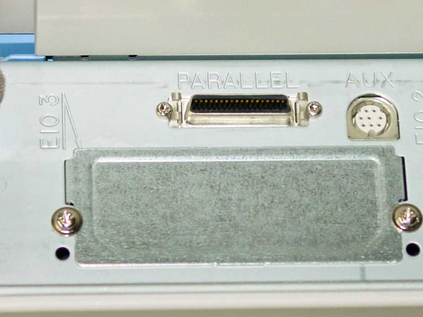 HP LaserJet 8150DN rear panel showing parallel port and AUX connector with EIO expansion slot cover