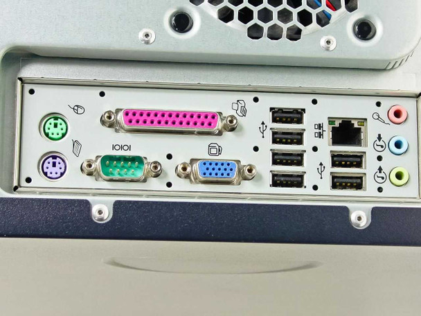 HP Compaq dx2000M rear I/O panel close-up showing 2x PS/2, parallel DB-25, serial DB-9, VGA DB-15, 4x USB 2.0, RJ-45 Ethernet, and 3.5mm audio jacks