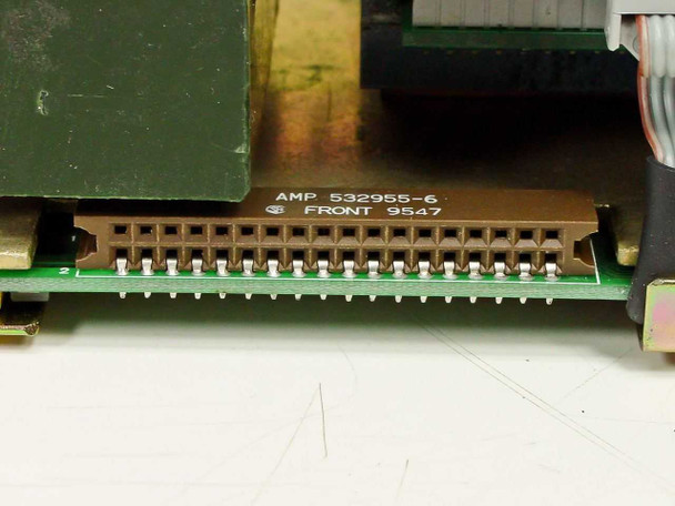 Varian 929-4025 AMP 532955-6 edge connector closeup – 26-pin IDC card-edge connector marked FRONT 9547 on green PCB