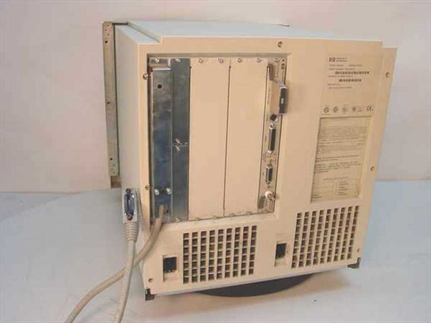 HP A2421A HP3000 957RX server rear panel showing 4 expansion slots, I/O connectors, power inlet, and cooling fan