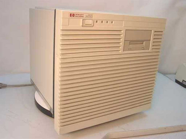 HP A2421A HP3000 957RX deskside tower server front panel view showing HP logo, drive bays, and ventilation louvers