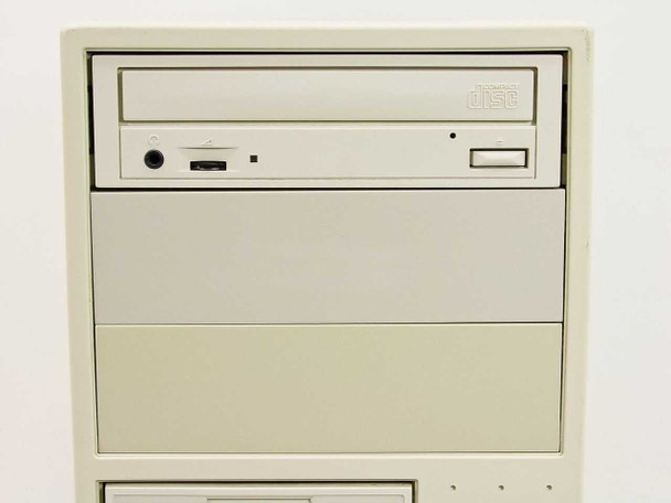 Dell Dimension XPS P90 — close-up of upper front panel showing CD-ROM drive with headphone jack and volume wheel