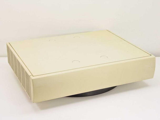 Sun 3/110 Prisum workstation top and front view — cream beige desktop enclosure on tilt stand with ventilation slots on left side