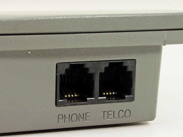 US Robotics USR5633A close-up of dual RJ-11 ports labeled PHONE and TELCO on side of modem