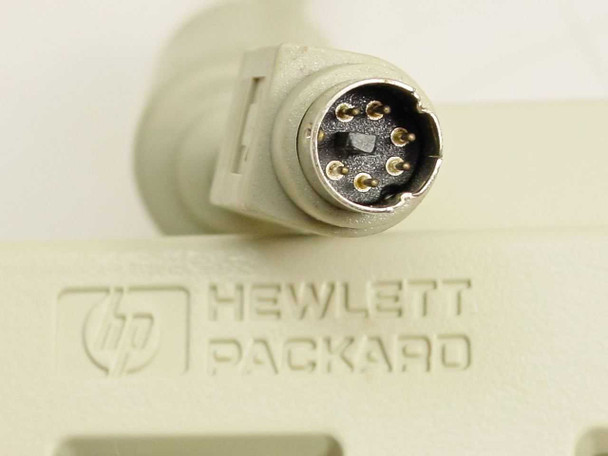 HP Hewlett-Packard C3346-60201 keyboard — close-up of 6-pin Mini-DIN PS/2 connector and Hewlett-Packard logo embossed on case