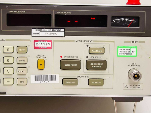 HP 8970A front panel right section — INSERTION GAIN and NOISE FIGURE LED displays, CALIBRATE button, MEASUREMENT mode buttons, SMOOTHING controls, INPUT 10-1000 MHz connector, calibration sticker