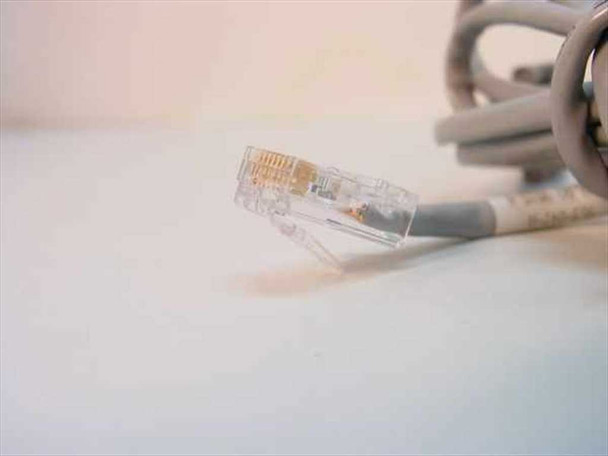 Close-up of RJ45 plug end of RS-232 serial console cable with gray cable jacket