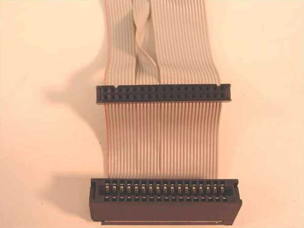 Close-up of two 34-pin IDC connectors on the dual floppy ribbon cable, showing pin rows and cable body