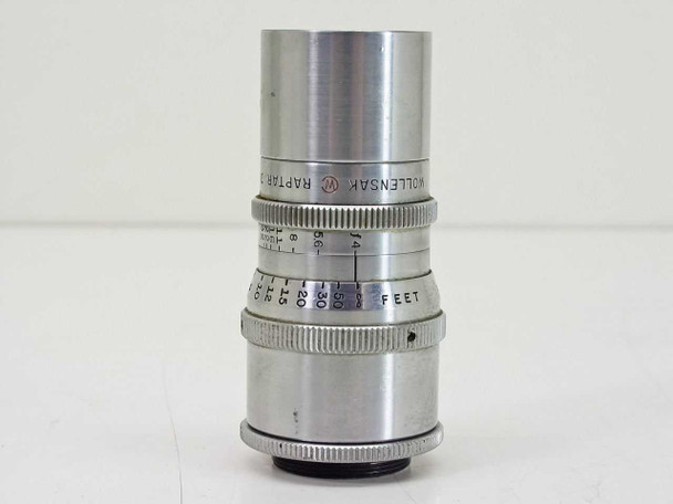 Wollensak Raptar 3 inch F/4 Cine Telephoto C-mount lens — front three-quarter view showing focus and aperture rings with feet markings
