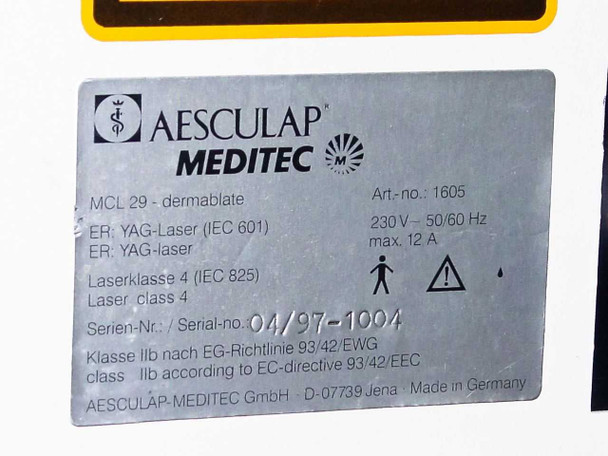 Aesculap Meditec manufacturer nameplate showing model MCL 29 Dermablate, Art. No. 1605, 230V 50/60Hz max 12A, Serial No. 04/97-1004, IEC 601/825 Class 4, EC Directive 93/42/EEC Class IIb, Made in Germany