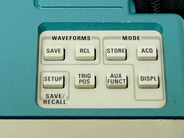Tektronix 224 top panel keypad showing WAVEFORMS and MODE sections — SAVE, RCL, STORE, ACQ, SETUP, TRIG POS, AUX FUNCT, DISPL buttons