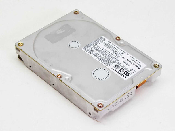 Quantum Fireball 2110AT 2.1GB IDE hard drive — bottom view showing underside label and drive casing with edge wear