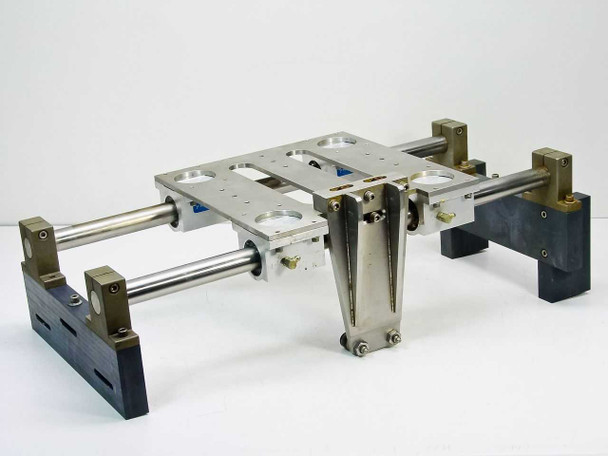 Thomson SSUPB16 Super Smart Pillow Block double end supported linear guide assembly — 3/4 angle view showing dual shafts, 4 pillow blocks, aluminum table top, and dark end supports