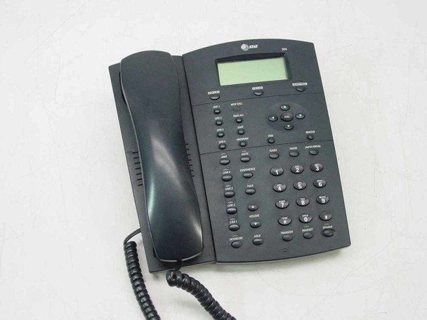 AT&T 955 4-line corded speakerphone – front three-quarter view showing handset, keypad, and LCD display