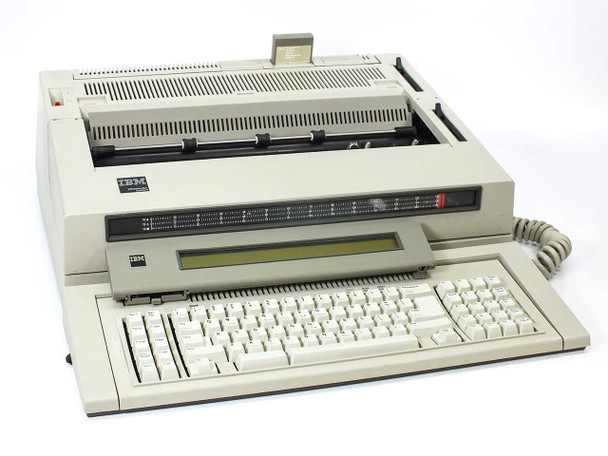 IBM 6770 Wheelwriter System/40 word processor typewriter — front three-quarter view showing full keyboard, LCD display panel, and print mechanism housing