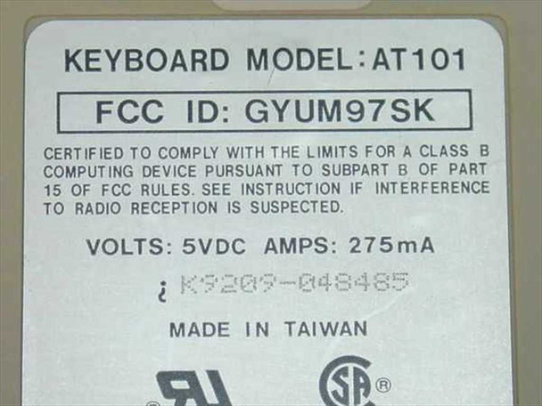 Dell AT101 keyboard – underside label showing model AT101, FCC ID GYUM97SK, 5VDC 275mA rating, Made in Taiwan, UL and CSA marks