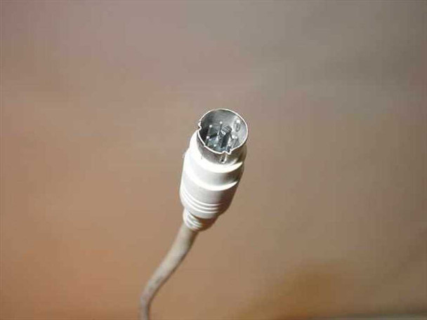 Dell AT101 keyboard – close-up of PS/2 connector (5-pin DIN) at end of coiled cable