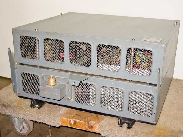 Front view of Decca Radar Type 65170 transceiver unit — two-bay stacked enclosure with mesh panels, brass waveguide connector visible on lower section