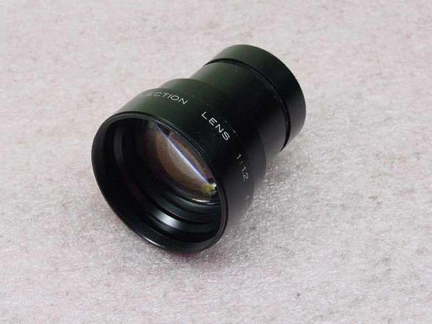 Elmo 50mm f/1.2 projection lens — front three-quarter view showing multi-element front glass and black barrel with PROJECTION LENS and 1:1.2 markings