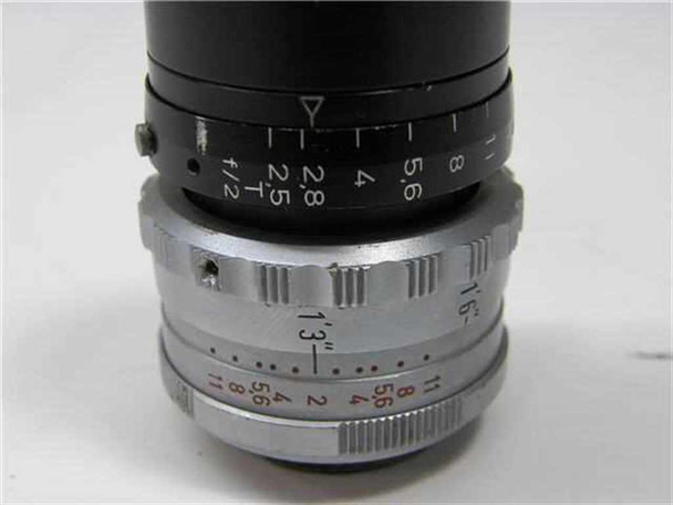 Kinoptik Paris Apochromat 25mm lens — close-up of aperture ring showing f/2 through f/16 scale and focus scale with depth-of-field markings