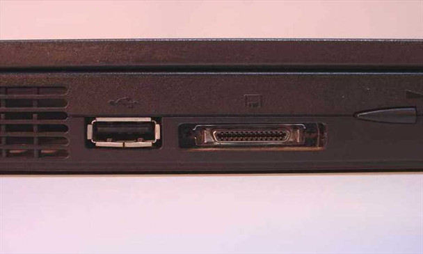 Compaq Armada 3500 left side — USB port and proprietary docking/expansion connector visible