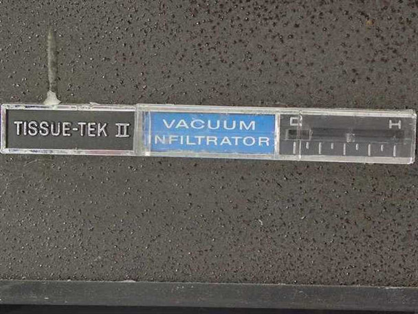 Lab-Tek Tissue-Tek II Vacuum Infiltrator front nameplate closeup — 'Tissue-Tek II Vacuum Infiltrator' label with temperature indicator scale