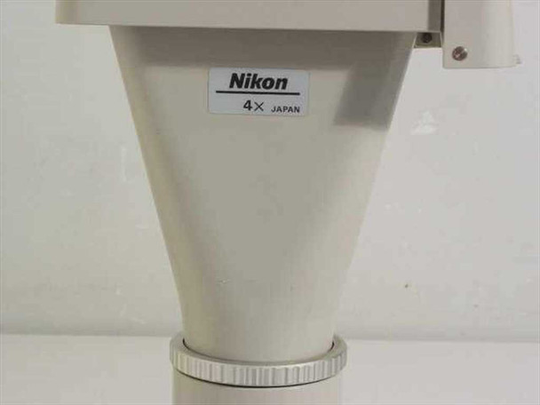 Nikon PFX 4x reduction cone close-up showing 'Nikon 4× JAPAN' label and base coupling ring