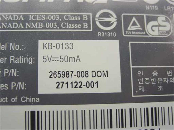 Compaq KB-0133 bottom label showing model number KB-0133, P/N 265987-008, series P/N 271122-001, and 5V 50mA power rating