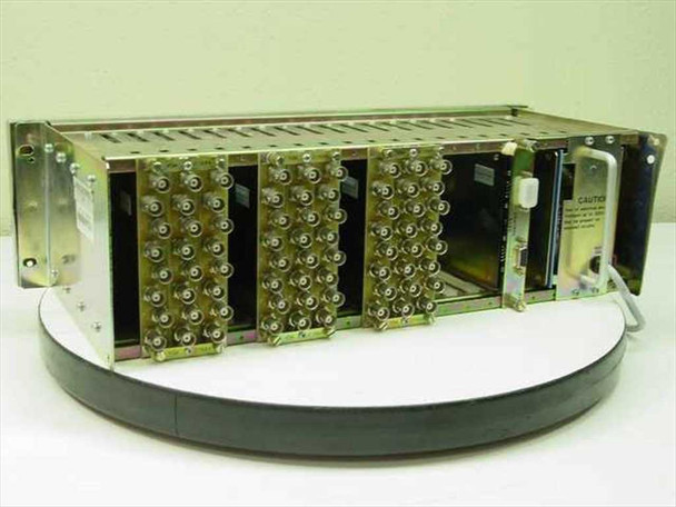 Sigma Electronics SS-2100-16 card frame – rear/interior view showing BNC-populated backplane and empty card slots