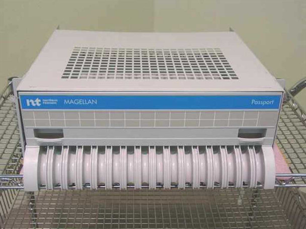 Nortel Magellan Passport chassis top section close-up showing Northern Telecom Magellan branding and card slot ventilation