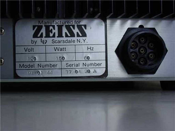 Zeiss 91 01 44 rear label showing input specs: 120V, 150W, 60Hz, model number 91 01 44, and multi-pin output connector