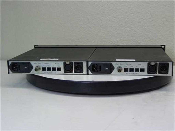 Sonic Solutions 702910 AD/DA converter rear panel showing IEC power inlet, Word Sync BNC, Optical TOSLINK In/Out, and XLR Aux connectors on both units