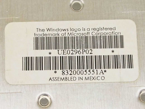 Toshiba UE0296P02 keyboard label showing part number, 8320005551A, and Assembled in Mexico