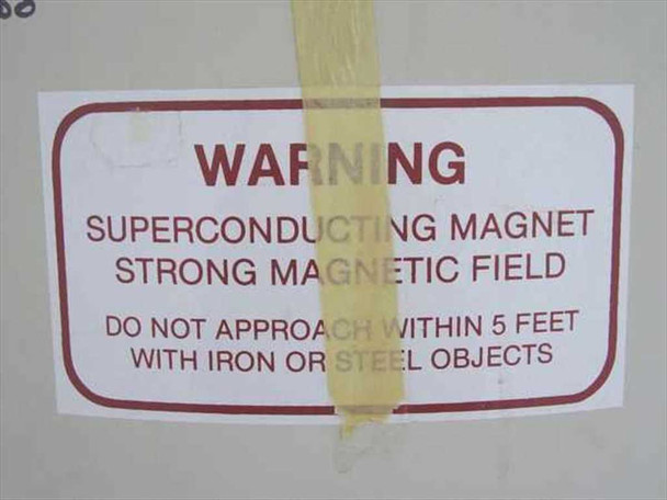 Warning label on NMR magnet cryostat: Superconducting Magnet Strong Magnetic Field — Do Not Approach Within 5 Feet With Iron or Steel Objects