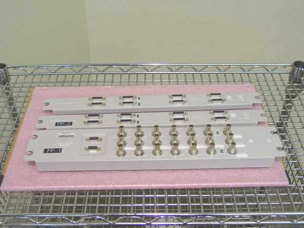 Nortel Passport 6480 front panels laid flat — DS3/E3 sparing panel NTFP99AB-02 and DS1/E1 balanced panels NTFP10BA
