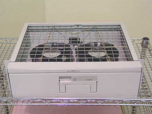 Nortel Passport 6480 DC power supply unit open view showing internal fan assembly and wiring through wire guard