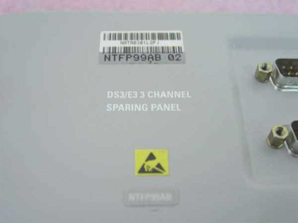 Nortel Passport NTFP99AB-02 DS3/E3 3 Channel Sparing Panel close-up showing label, part number, and DB-9 connectors